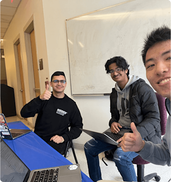 Students collaborating on projects at MentorMates